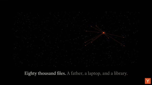 장면 17 — “80,000 files. A father, a laptop, and a library.”